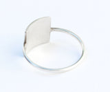 back of silver square ring