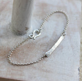 hammered bar bracelet in silver by dreaming tree creations