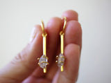 Crystal hoop dangle earrings in gold