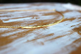 Golden lining textures and shine necklace